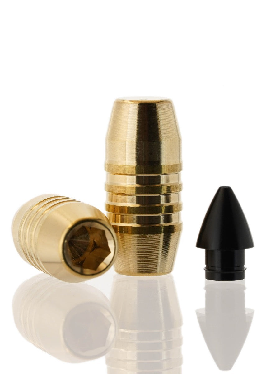 brass hollow point tipped rifle bullet